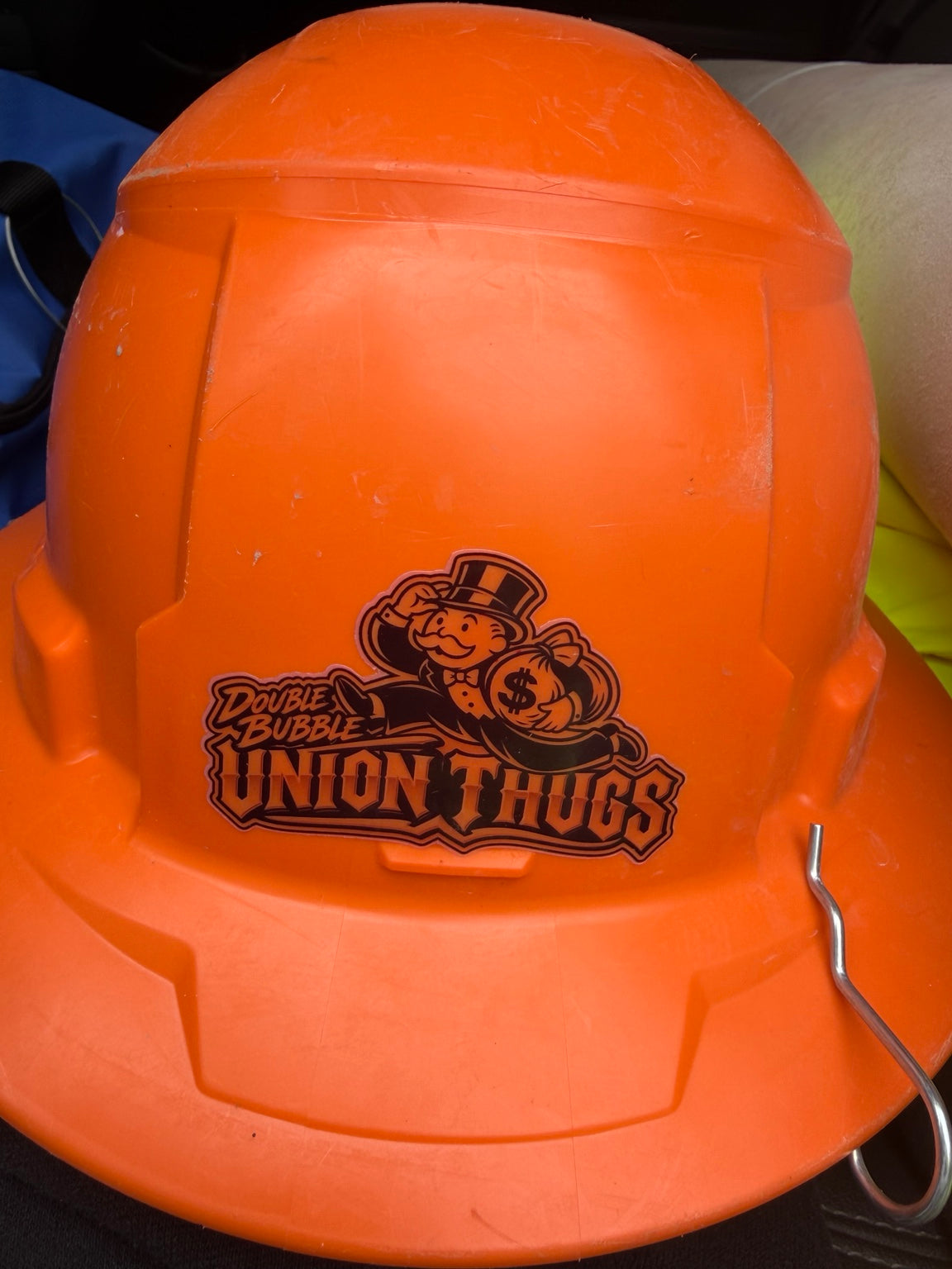 Double Bubble Union Thugs decal applied to an orange hard hat