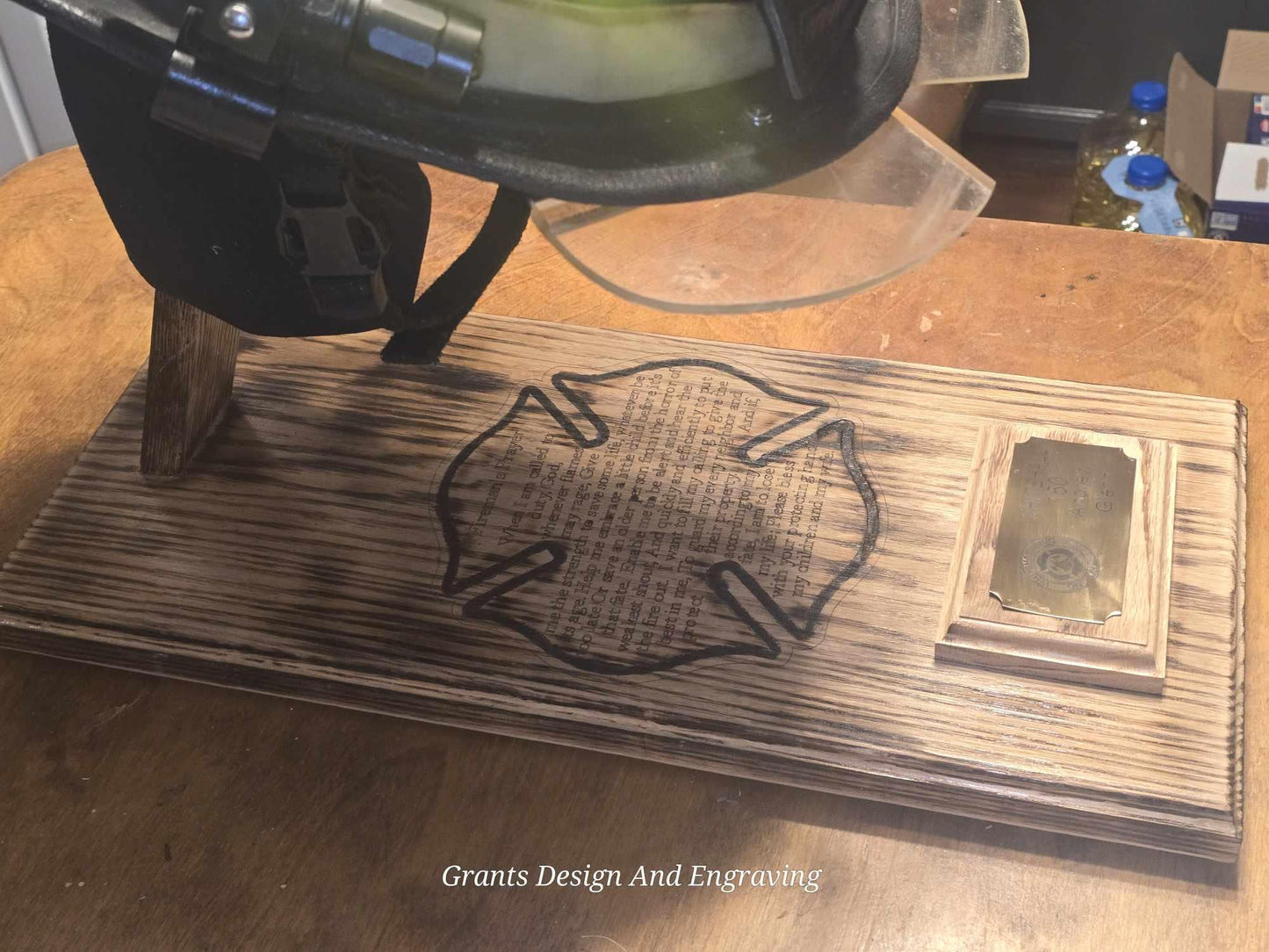 Wood Fire Fighter Helmet Display with a Laser engraved Maltese cross with incorporated fireman's prayer with a personalized brass name plate