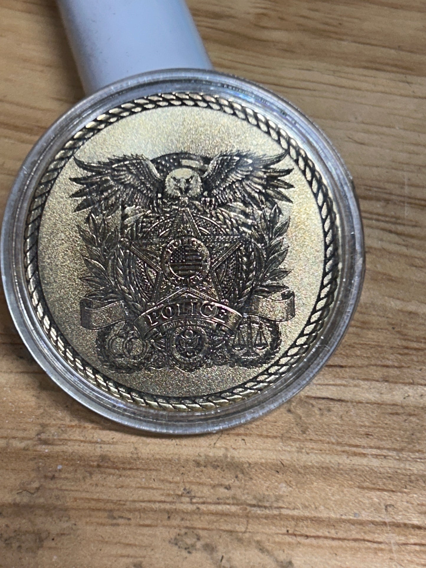 Police challenge coin