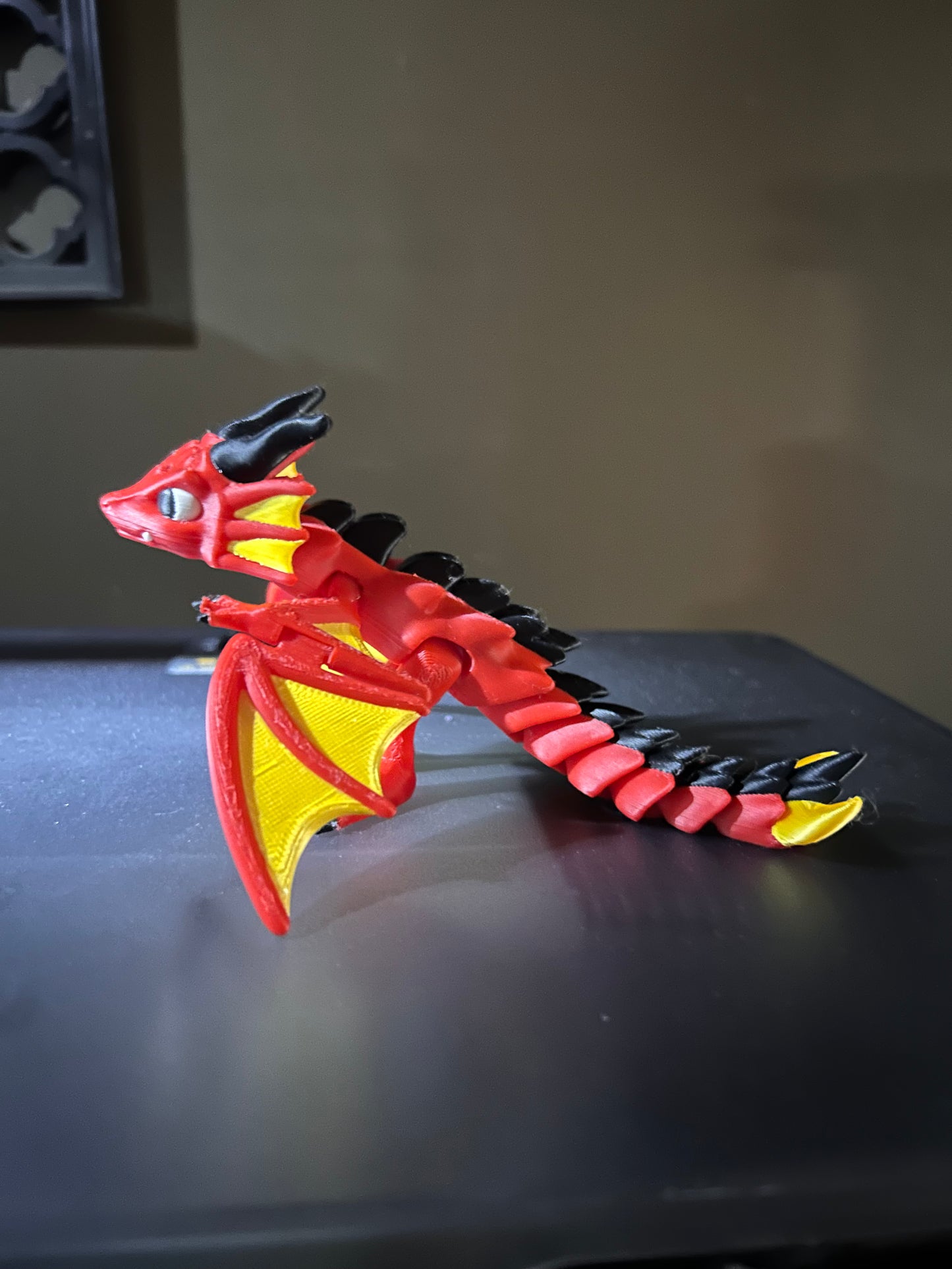 Flexi dragon with flapping wings.