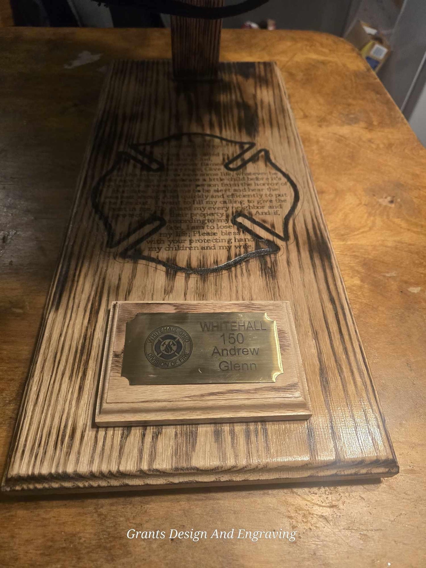 Wood Fire Fighter Helmet Display with a Laser engraved Maltese cross with incorporated fireman's prayer with a personalized brass name plate
