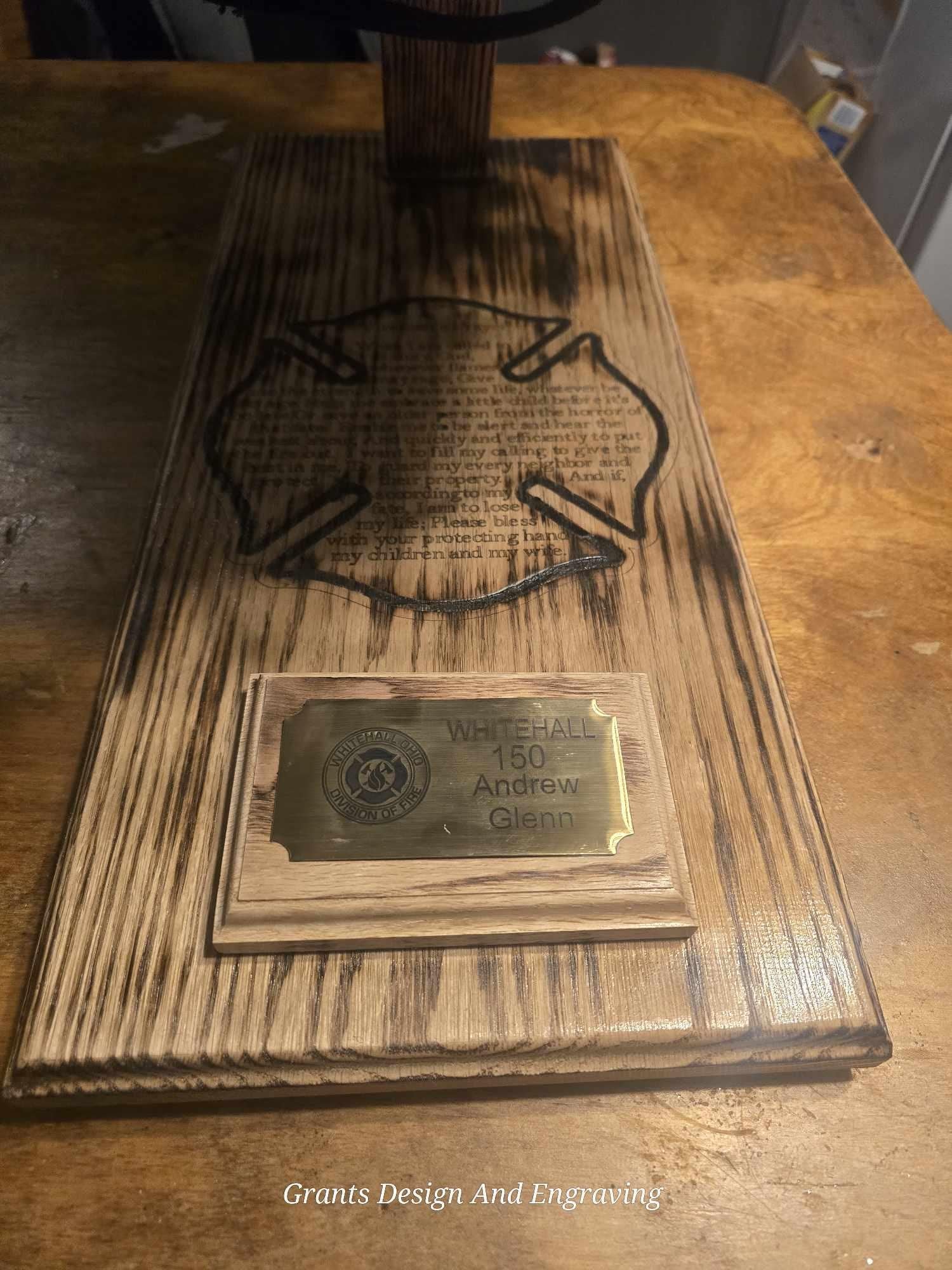 Wood Fire Fighter Helmet Display with a Laser engraved Maltese cross with incorporated fireman's prayer with a personalized brass name plate