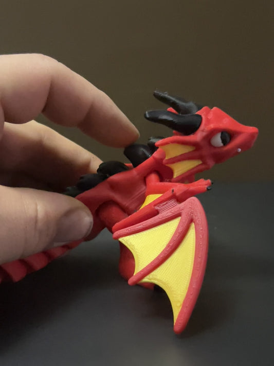 Flexi dragon with flapping wings.